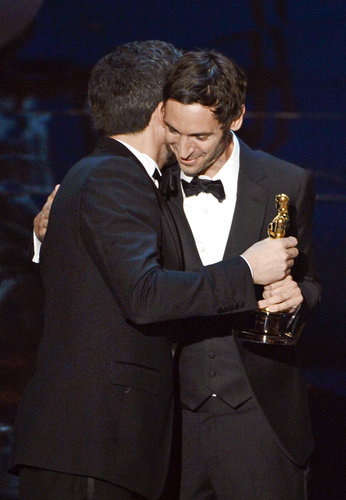 Ben Affleck and Malik Bendjelloul on stage at the Oscars 2013.
Ben Affleck and Malik Bendjelloul on stage at the Oscars 2013.