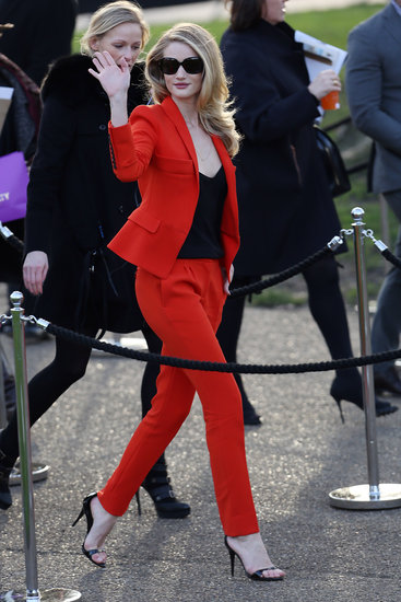 Rosie Huntington-Whiteley waved to her fans as she arrived at the Burberry Prorsum fashion presentation on Monday.
Rosie Huntington-Whiteley waved to her fans as she arrived at the Burberry Prorsum fashion presentation on Monday.