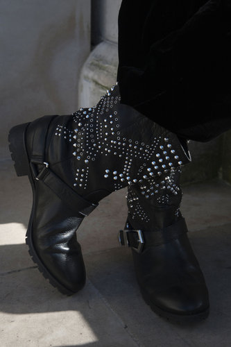 Stud and rhinestone details added interest to a pair of tough biker boots.
Stud and rhinestone details added interest to a pair of tough biker boots.