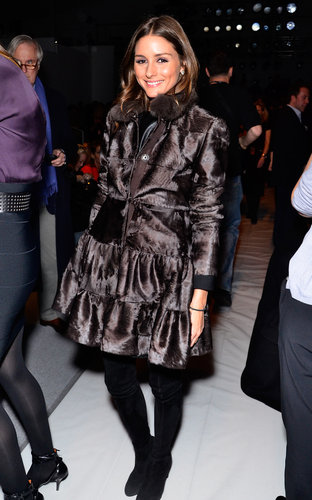 Olivia proved that black and brown make a friendly duo in a chocolate fur coat and black suede boots at Dennis Basso in New York.
Olivia proved that black and brown make a friendly duo in a chocolate fur coat and black suede boots at Dennis Basso in New York.