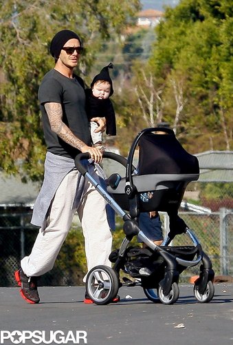 David Beckham had his hands full with baby girl Harper in LA in November 2011 before heading off to one of Romeo's soccer games.
David Beckham had his hands full with baby girl Harper in LA in November 2011 before heading off to one of Romeo's soccer games.