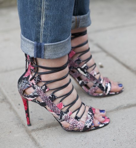 Jeans got a sexy lift thanks to these lace-up snake-print sandals.
Jeans got a sexy lift thanks to these lace-up snake-print sandals.