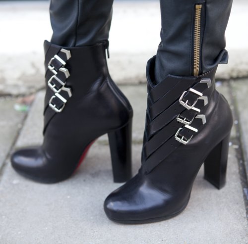 Buckle detailing on these Christian Louboutin ankle boots lent a tough touch to this street-style look.
Buckle detailing on these Christian Louboutin ankle boots lent a tough touch to this street-style look.
