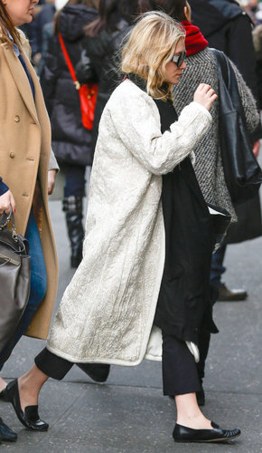 On her way into Bergdorf Goodman in NYC, Ashley Olsen showed off black-and-white Winter style in a long white coat, cropped pants, and loafers.
On her way into Bergdorf Goodman in NYC, Ashley Olsen showed off black-and-white Winter style in a long white coat, cropped pants, and loafers.