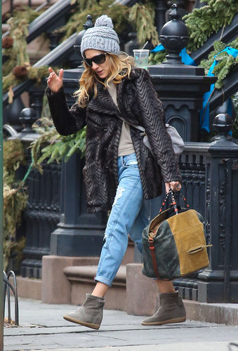 Sarah Jessica Parker headed out of her NYC apartment in a layered-up outfit, including a gray knit beanie, fur coat, ripped boyfriend jeans, and Isabel Marant booties.
Sarah Jessica Parker headed out of her NYC apartment in a layered-up outfit, including a gray knit beanie, fur coat, ripped boyfriend jeans, and Isabel Marant booties.