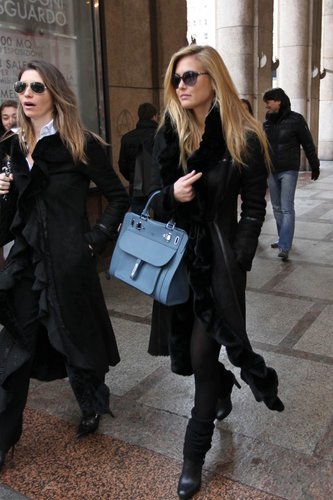 Bar Refaeli's all-black Milan look was given a jolt of color via her structured blue satchel.
Bar Refaeli's all-black Milan look was given a jolt of color via her structured blue satchel.