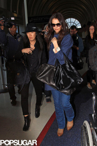 Katie Holmes and Jeanne Yang made their way through LAX on Wednesday.
Katie Holmes and Jeanne Yang made their way through LAX on Wednesday.