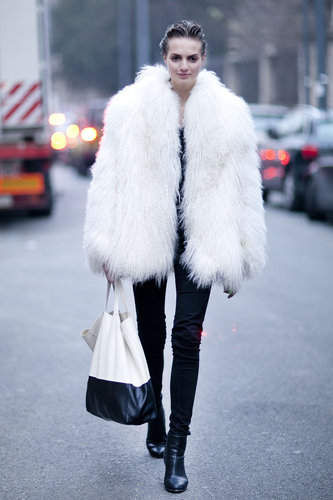 A white furry coat balanced out skinny bottoms and a minimalist tote.
A white furry coat balanced out skinny bottoms and a minimalist tote.