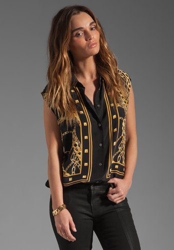 Evelyn Lozada's Black & Gold Chain Sleeveless Top
