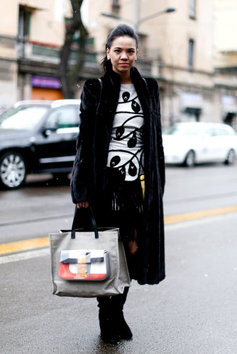 This attendee made a statement in a unique top and bold bag in hand.
This attendee made a statement in a unique top and bold bag in hand.