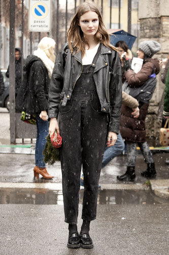 A '90s moment in overalls, loafers, and a leather jacket.
A '90s moment in overalls, loafers, and a leather jacket.