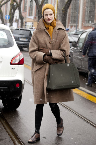 An oversize coat in a classic camel hue was the star of this showgoer's look.
An oversize coat in a classic camel hue was the star of this showgoer's look.