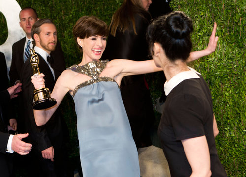 Anne Hathaway couldn't contain her excitement at the Vanity Fair Oscars afterparty.
Anne Hathaway couldn't contain her excitement at the Vanity Fair Oscars afterparty.
