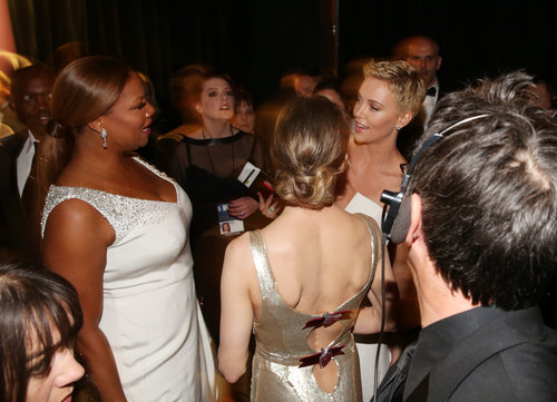 Queen Latifah and Charlize Theron backstage at the 2013 Oscars.
Queen Latifah and Charlize Theron backstage at the 2013 Oscars.