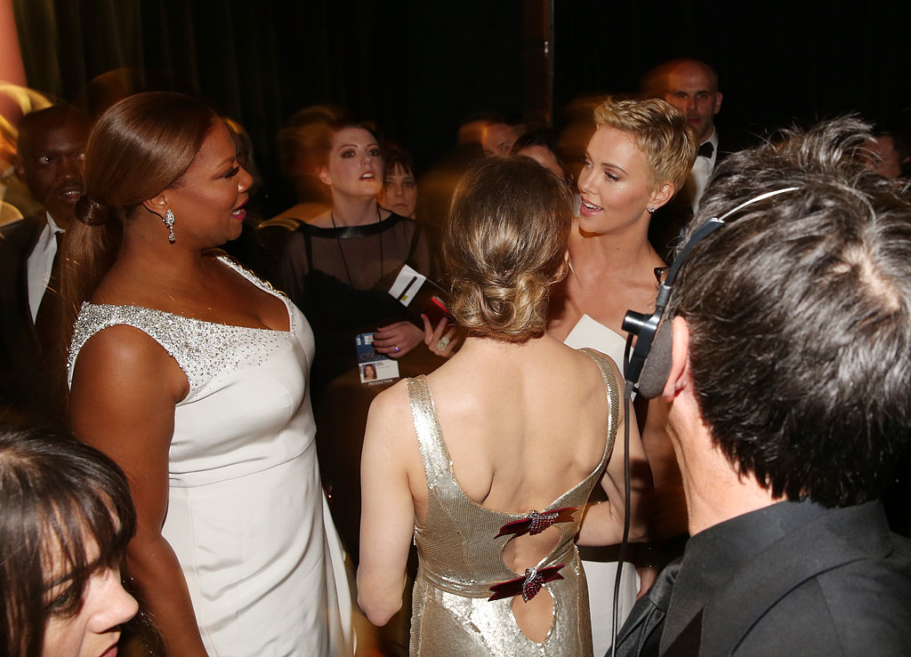 Queen Latifah and Charlize Theron backstage at the 2013 Oscars.
Queen Latifah and Charlize Theron backstage at the 2013 Oscars.
