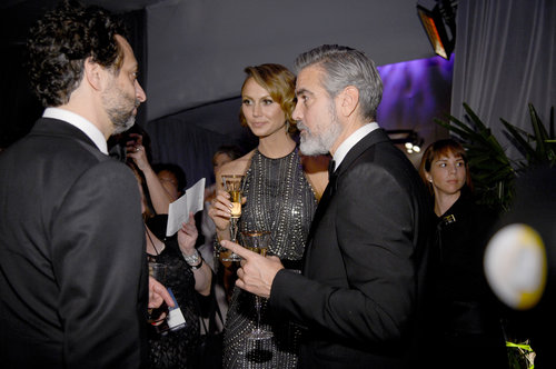 George Clooney and Stacy Keibler toasted with Champange at the Governors Ball after the Oscars.
George Clooney and Stacy Keibler toasted with Champange at the Governors Ball after the Oscars.