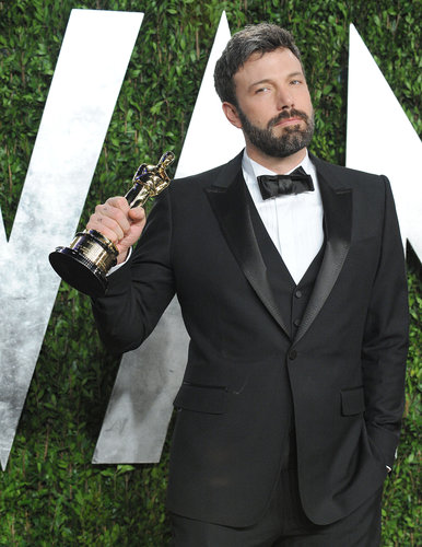 Ben Affleck raised his Oscar on the way into Vanity Fair 's Oscar party.
Ben Affleck raised his Oscar on the way into Vanity Fair 's Oscar party.