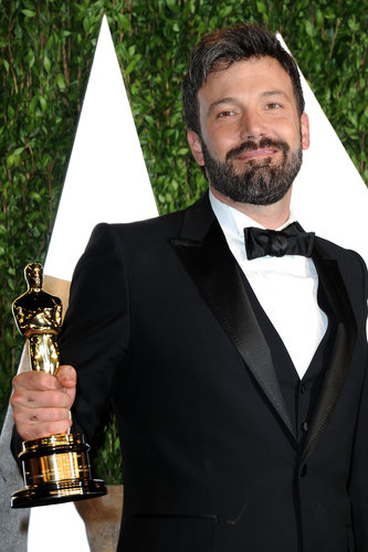 Ben Affleck gave a big smile on his way into the Vanity Fair Oscars after-party.
Ben Affleck gave a big smile on his way into the Vanity Fair Oscars after-party.
