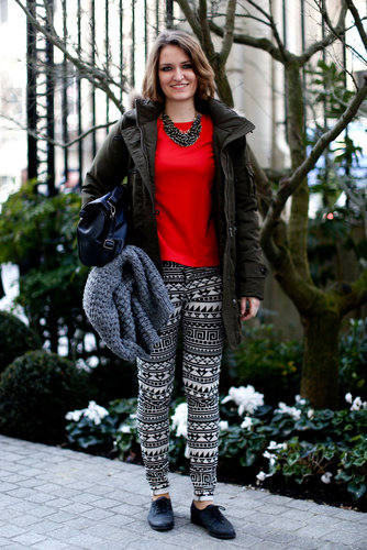 Printed pants and a red tee added up to a statement-making effect in this showgoer's ensemble.
Printed pants and a red tee added up to a statement-making effect in this showgoer's ensemble.