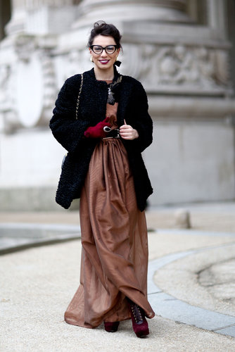Day glamour in the form of a floor-length dress and furry coat.
Day glamour in the form of a floor-length dress and furry coat.