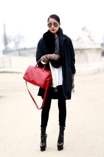 A sharp, fashion-forward play on the classics with a bold apple-red bag to finish it off.
A sharp, fashion-forward play on the classics with a bold apple-red bag to finish it off.