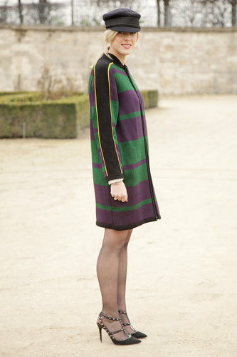 A smart cap played boyish opposites to a bright sheath and Valentino heels.
A smart cap played boyish opposites to a bright sheath and Valentino heels.