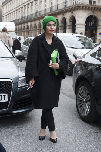 Pops of bright green played up this all-black outfit.
Pops of bright green played up this all-black outfit.