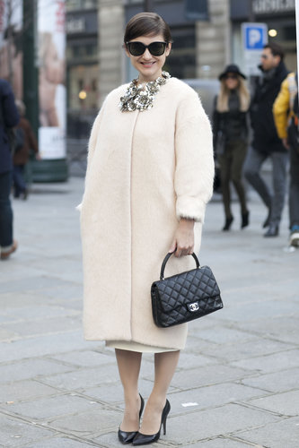 This attendee nailed vintage-feeling femininity in a car coat, classic Chanel, and oversize cat-eye frames.
This attendee nailed vintage-feeling femininity in a car coat, classic Chanel, and oversize cat-eye frames.