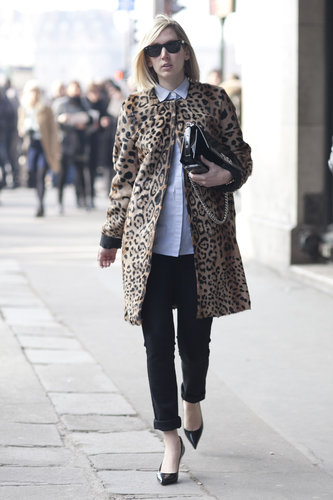 A leopard-print coat plays a posh complement to a basic button-up and pants.
A leopard-print coat plays a posh complement to a basic button-up and pants.