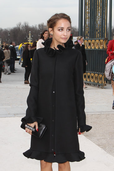 Nicole Richie wore a long black coat outside the Valentino show on Tuesday in Paris.
Nicole Richie wore a long black coat outside the Valentino show on Tuesday in Paris.