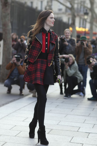 Coco Rocha hit the streets in punk-girl plaid.
Coco Rocha hit the streets in punk-girl plaid.