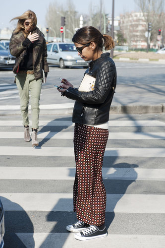 Pajama-style trousers were made street-ready with Converse and a leather jacket.
Pajama-style trousers were made street-ready with Converse and a leather jacket.
