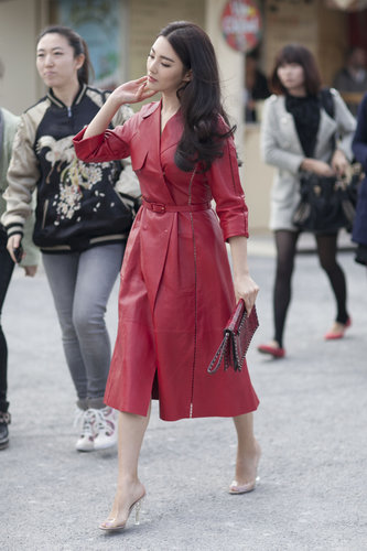 Red leather livened up a classic trench.
Red leather livened up a classic trench.