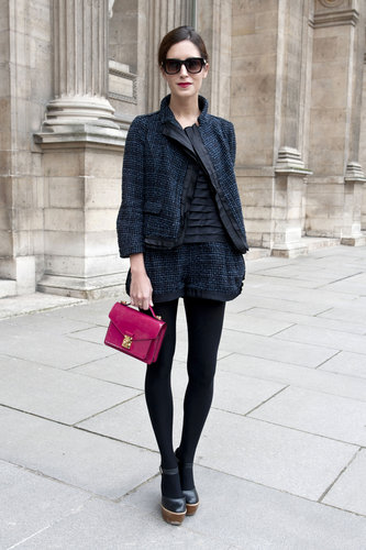 A tweedy shorts suit got a punchy finish with a sweet raspberry bag in hand.
A tweedy shorts suit got a punchy finish with a sweet raspberry bag in hand.