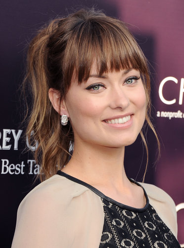 It was a flirty, textured ponytail with bangs for Olivia at the 2011 Butterfly Ball — the perfect style to show off her two-toned hair color.
It was a flirty, textured ponytail with bangs for Olivia at the 2011 Butterfly Ball — the perfect style to show off her two-toned hair color.