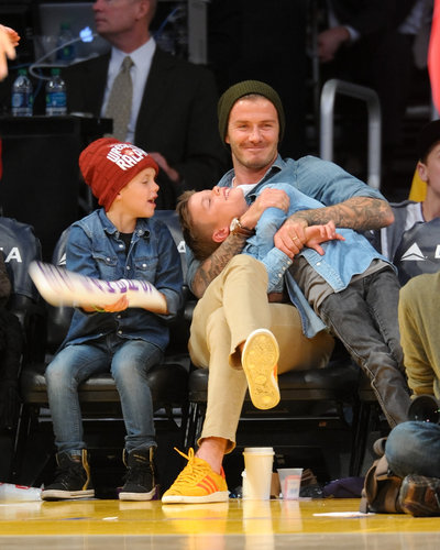 David Beckham clowned around courtside with his sons Cruz and Romeo during a Lakers game in November 2012.
David Beckham clowned around courtside with his sons Cruz and Romeo during a Lakers game in November 2012.