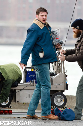 Tom Hardy Cuddles Up to a Canine Costar on Set Tom Hardy Cuddles Up to a Canine Costar on Set