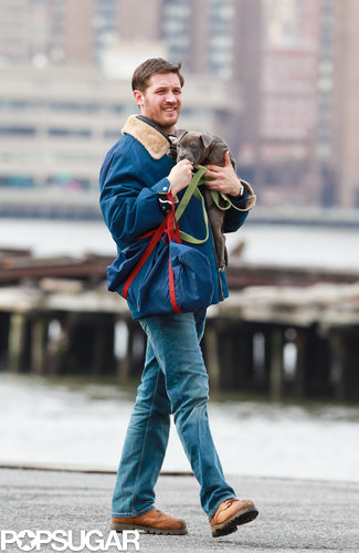 Tom Hardy Cuddles Up to a Canine Costar on Set Tom Hardy Cuddles Up to a Canine Costar on Set