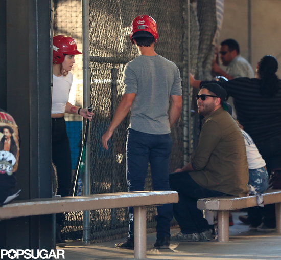 Kristen Stewart and Taylor Lautner hung out at the batting cages with friends.
Kristen Stewart and Taylor Lautner hung out at the batting cages with friends.