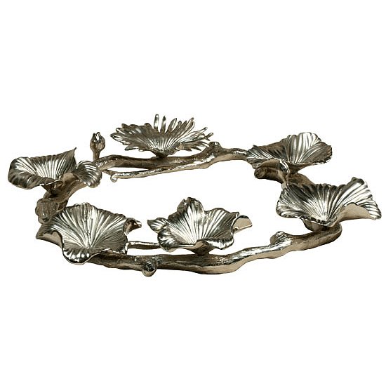 Pewter gingko leaves take the place of dishes on this unusual interpretation of a seder plate ($350).
Pewter gingko leaves take the place of dishes on this unusual interpretation of a seder plate ($350).
