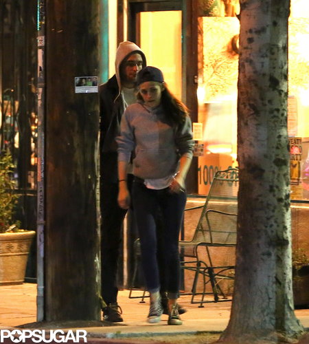 Robert and Kristen wore matching sweatshirts for date night.
Robert and Kristen wore matching sweatshirts for date night.
