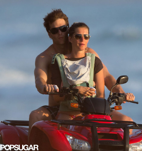 Tom Brady and Gisele Bündchen took Vivian on a beach ride.
Tom Brady and Gisele Bündchen took Vivian on a beach ride.