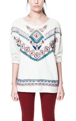 When the temperature drops at night, layer up in this Zara embroidered knit sweater ($60).
When the temperature drops at night, layer up in this Zara embroidered knit sweater ($60).