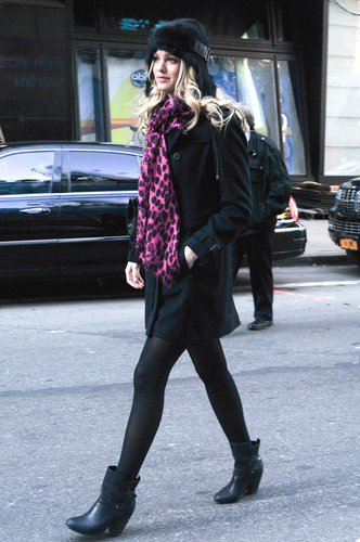 Erin Heatherton went head-to-toe black in NYC, then added a pop of print and color via her vibrant scarf.
Erin Heatherton went head-to-toe black in NYC, then added a pop of print and color via her vibrant scarf.