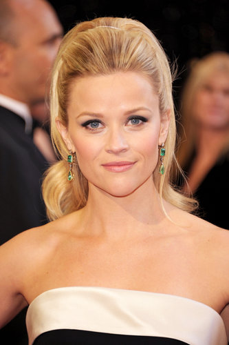 From her voluminous high pony to her classic black and white gown, Reese looked like a modern version of a classic Barbie at the 2011 Academy Awards.
From her voluminous high pony to her classic black and white gown, Reese looked like a modern version of a classic Barbie at the 2011 Academy Awards.