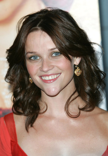 Reese arrived at the Vanity Fair premiere in 2004 with a brunette mane for her role as June Carter in Walk the Line. She complemented her darker hair with pastel green shadow and a warm pink flush on her lips and cheeks.
Reese arrived at the Vanity Fair premiere in 2004 with a brunette mane for her role as June Carter in Walk the Line. She complemented her darker hair with pastel green shadow and a warm pink flush on her lips and cheeks.