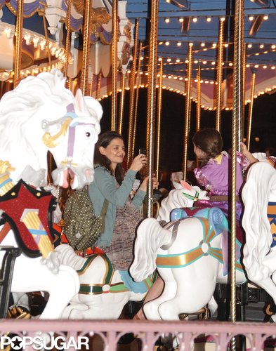 Katie Holmes rode a carousel with Suri.
Katie Holmes rode a carousel with Suri.