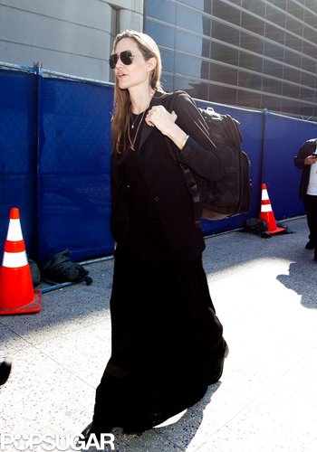 Angelina Denies Wedding Ring Rumors Upon Returning to LA Angelina Denies Wedding Ring Rumors Upon Returning to LA