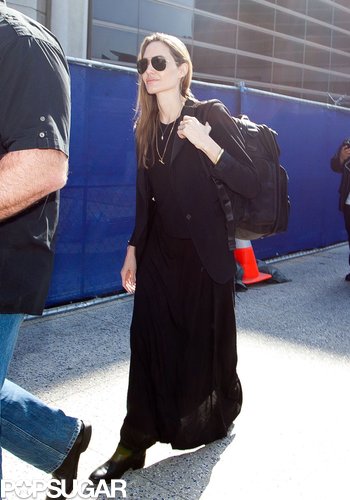 Angelina Denies Wedding Ring Rumors Upon Returning to LA Angelina Denies Wedding Ring Rumors Upon Returning to LA