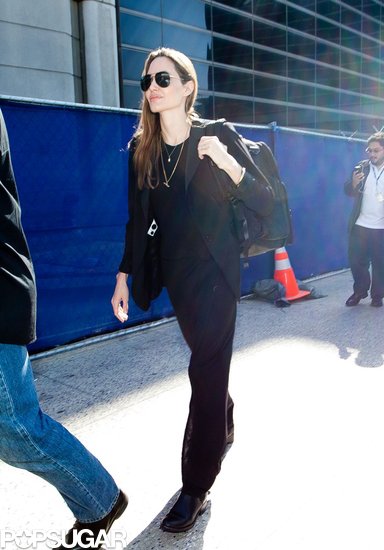 Angelina Denies Wedding Ring Rumors Upon Returning to LA Angelina Denies Wedding Ring Rumors Upon Returning to LA